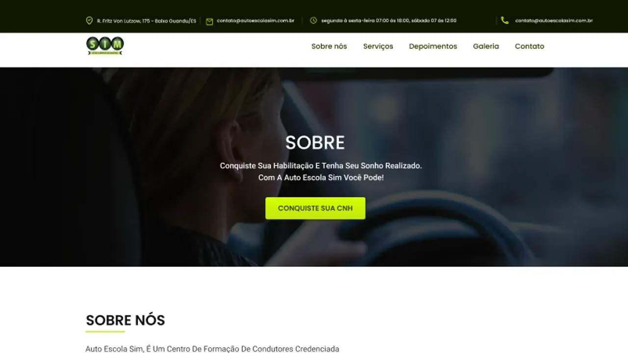 Segunda versão: barra escura de contato no topo, menu reorganizado e um herói sobre foto de motorista ao volante.